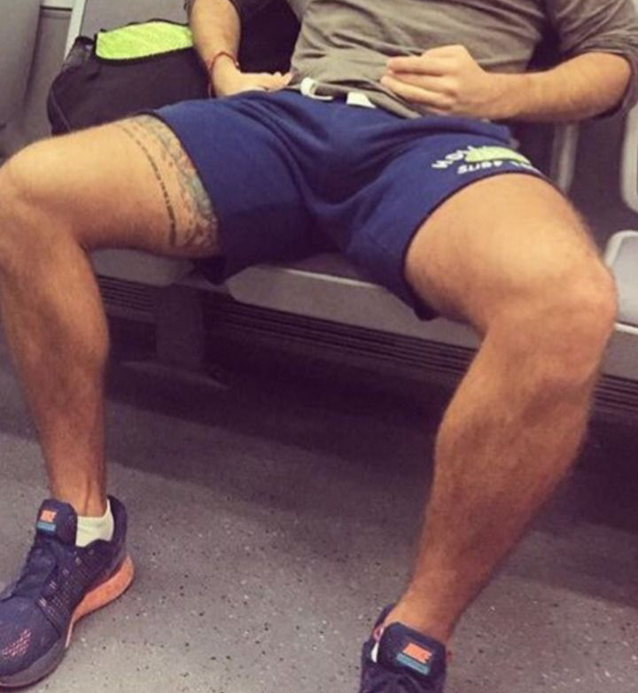 Manspreading guy in athletic gear