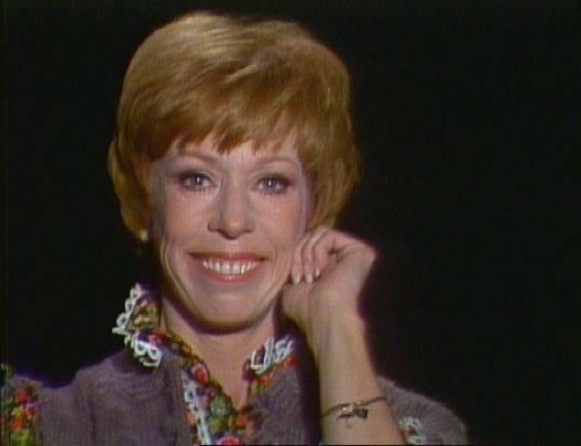 Carol Burnett tugging her ear