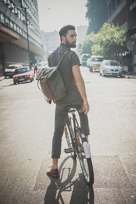 Bearded hipster guy on bicycle