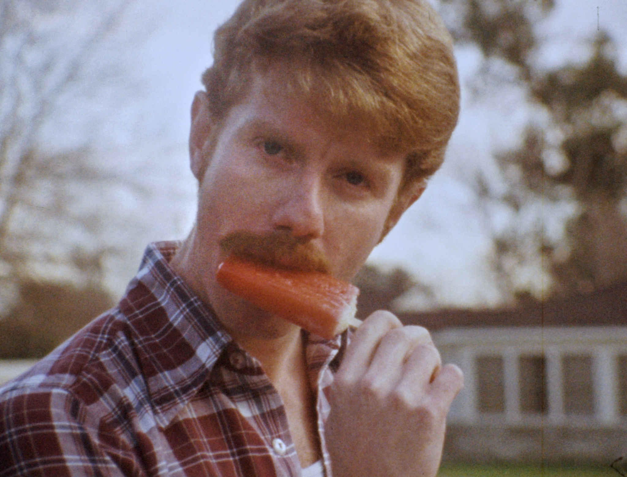 Redhead licking popsicle in Hot Truckin'