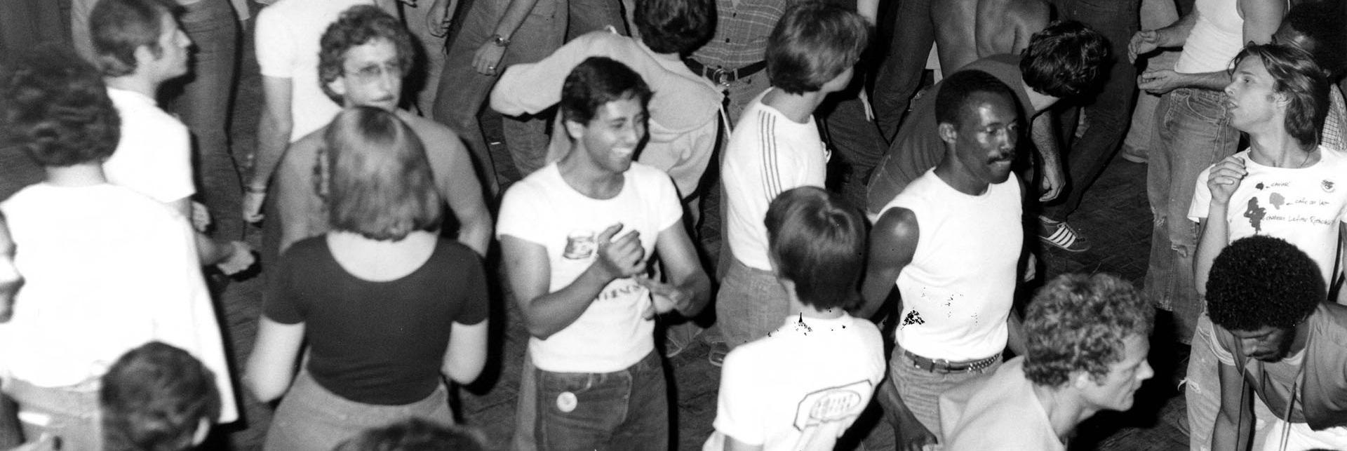 Gay men in the 1970s dancing