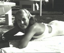 Joan Crawford sunbathing