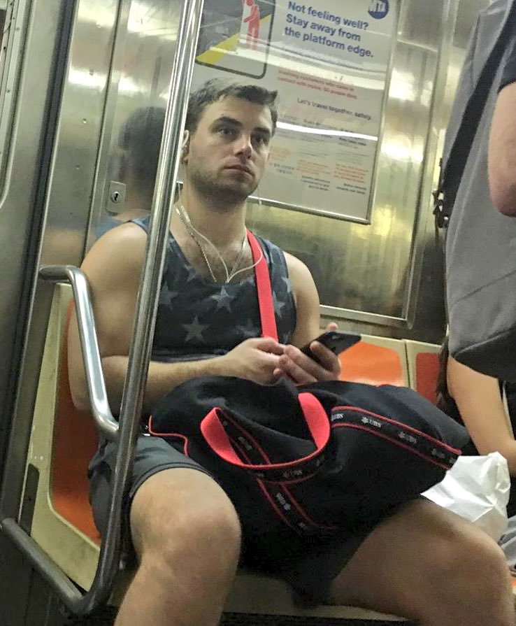 Manspreading jock on subway train
