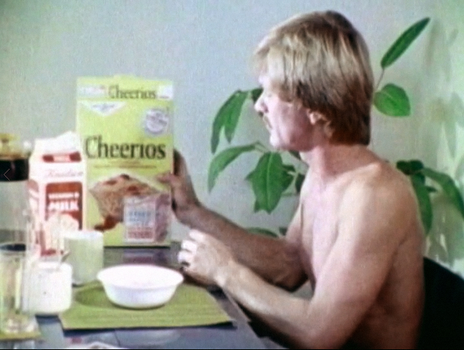 Dave Daniels eating Cheerios shirtless in Morning, Noon and Night