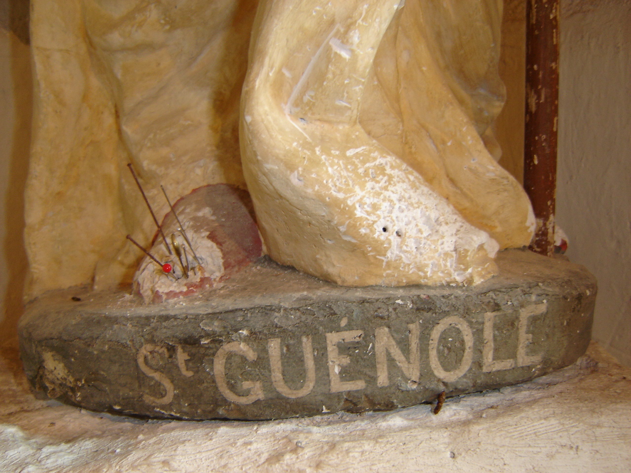 Statue of Saint Guignole pierced with needles