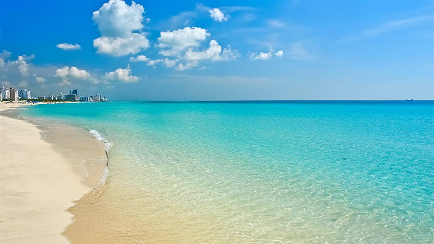 Long stretch of South Beach with its turquoise water